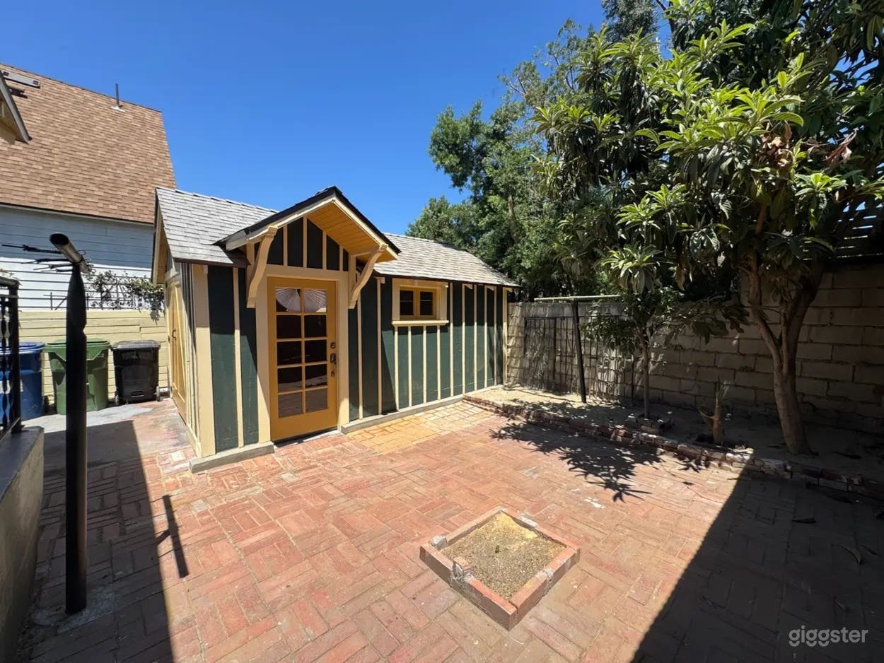 Rustic Backyard with Garage Photo 4