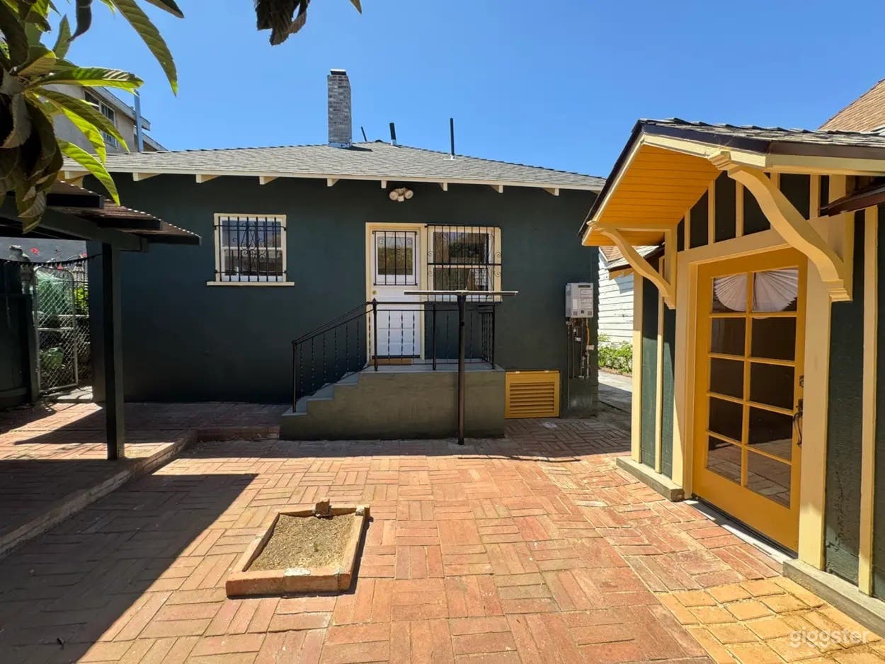 Rustic Backyard with Garage Photo 3