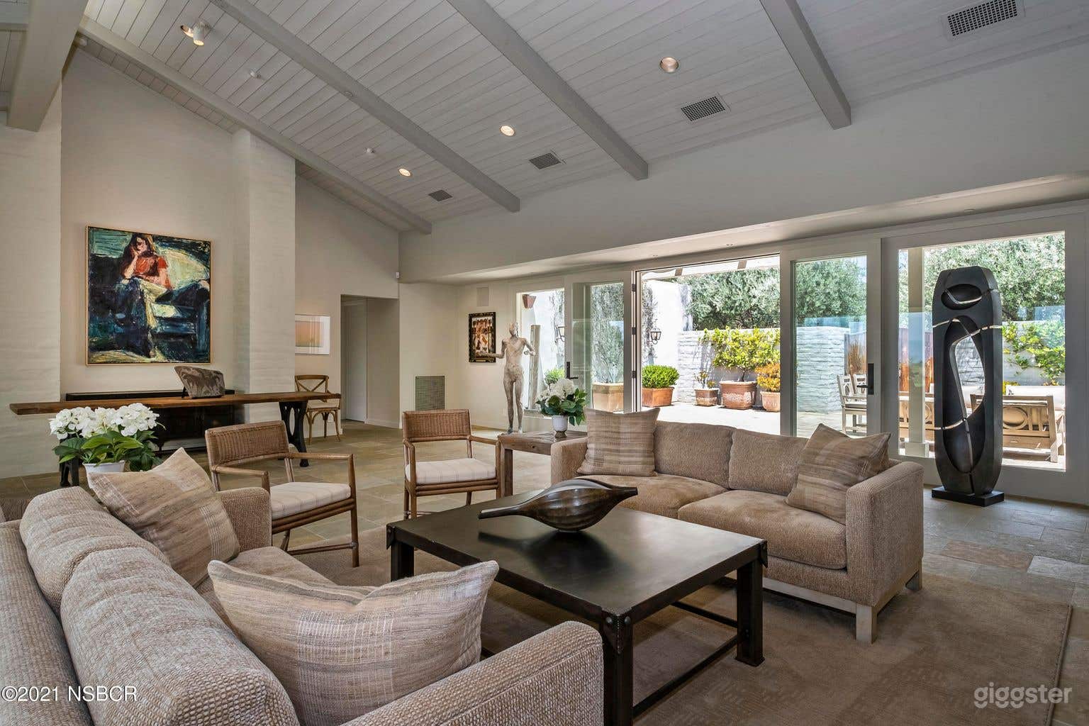 View of the living room/fireplace #2 with glass doors to the back yard