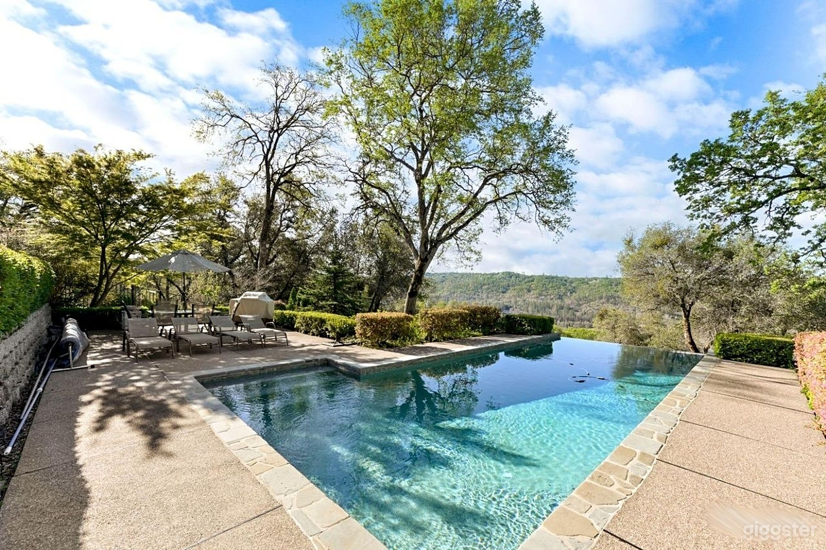 Scenic Outdoor Pool with Mountain Views Photo 1