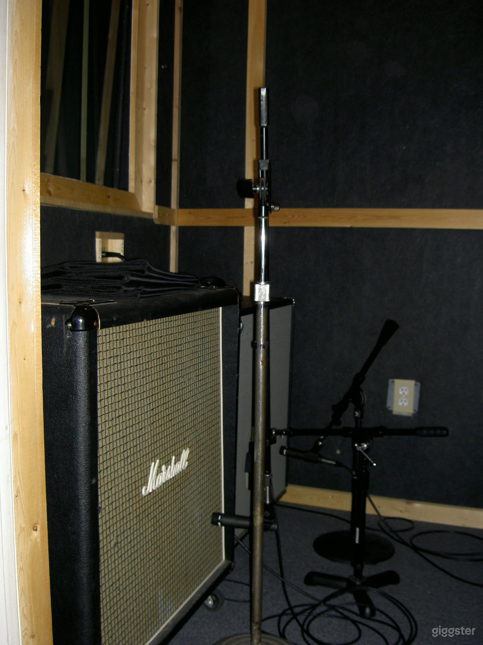 Isolation Booth. 5' x 6" with view of Studio and Control Room beyond.