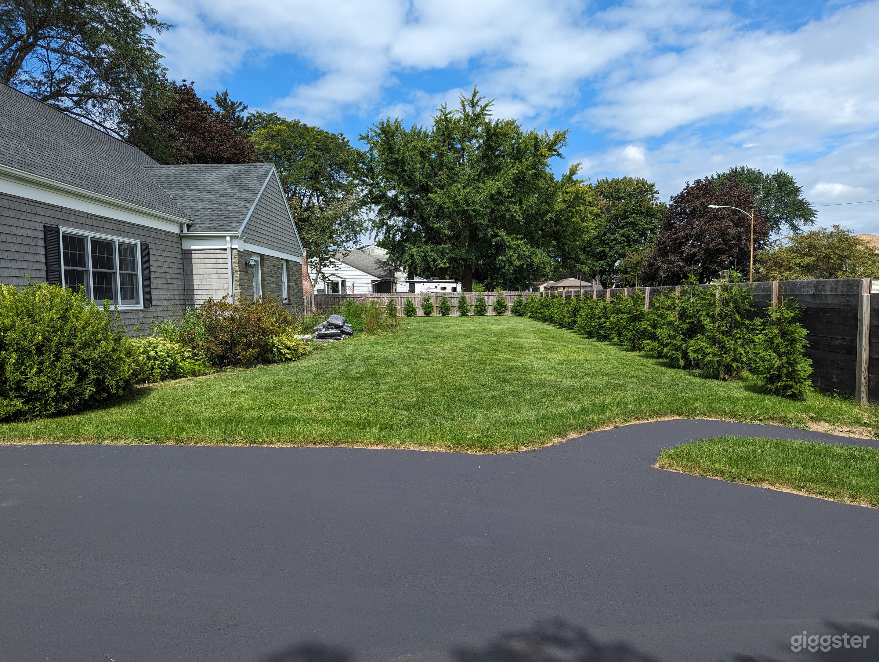 Remodeled 1950s Executive Cape style home. Can be easily converted to reflect period of original construction.
