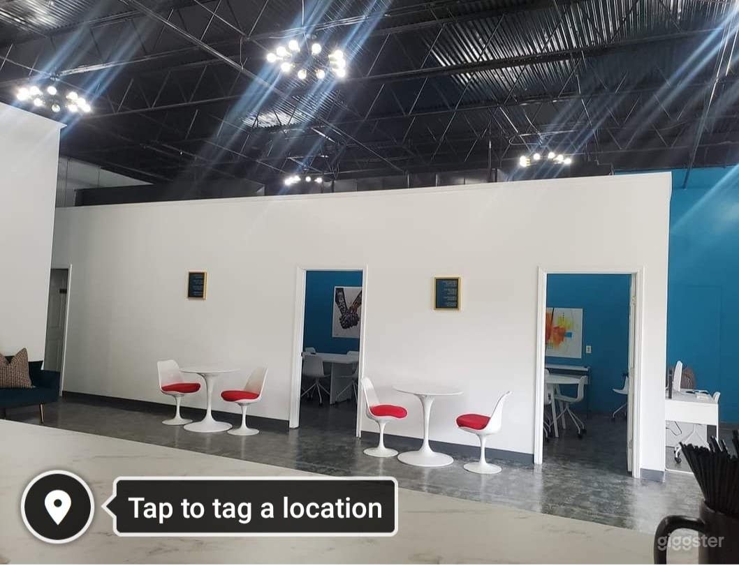 Open reception area with great lighting and aesthetics. White walls. 750sq feet