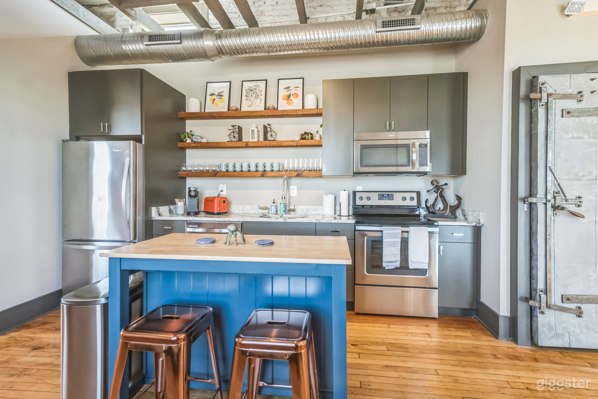 Full kitchen with island seating.