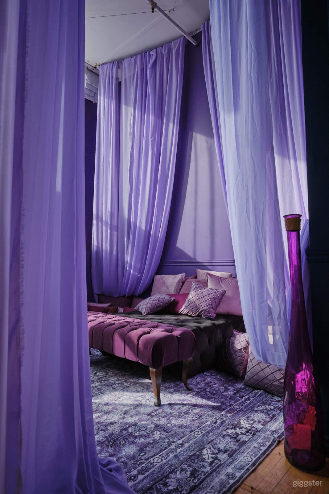 Our purple plounge with sheers and throw pillows