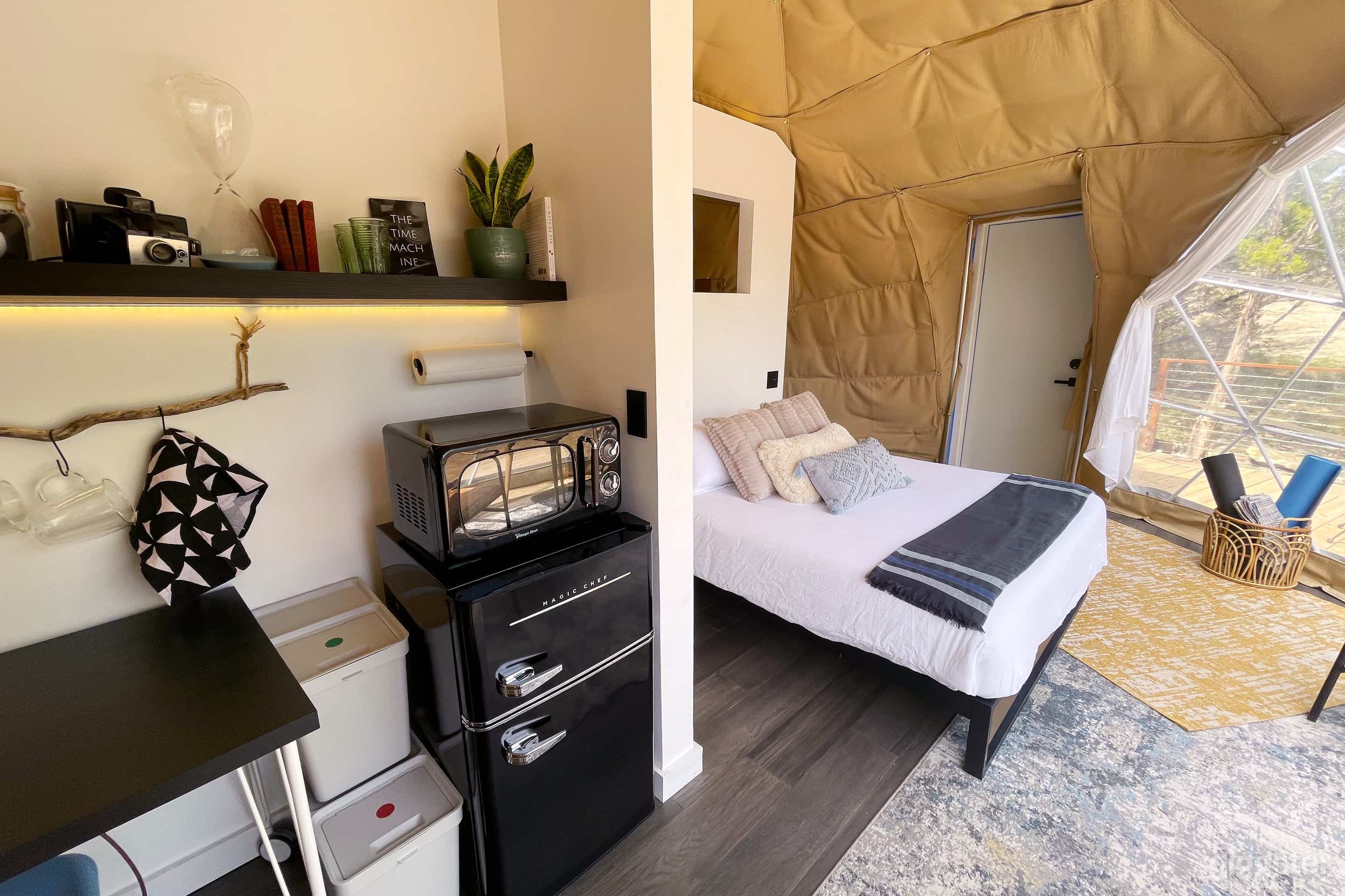 Kitchenette that houses a personal fridge and microwave, plus an inhouse coffee maker