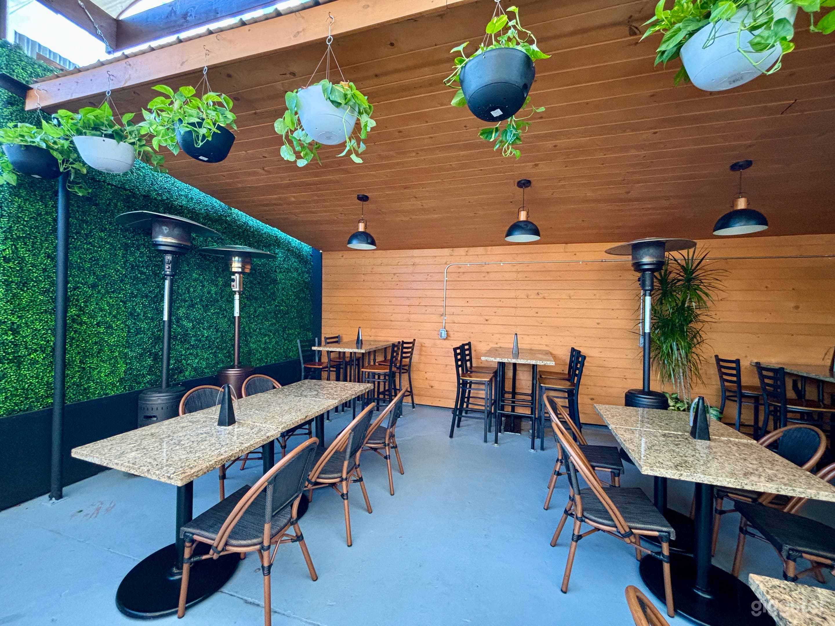 French Coffee Shop and Patio with lush greenery Photo 3