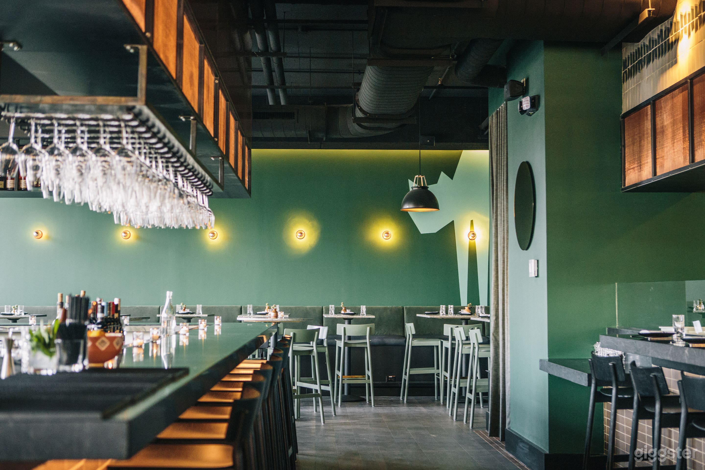 Bar, cocktail lounge, and kitchen facing counter seating