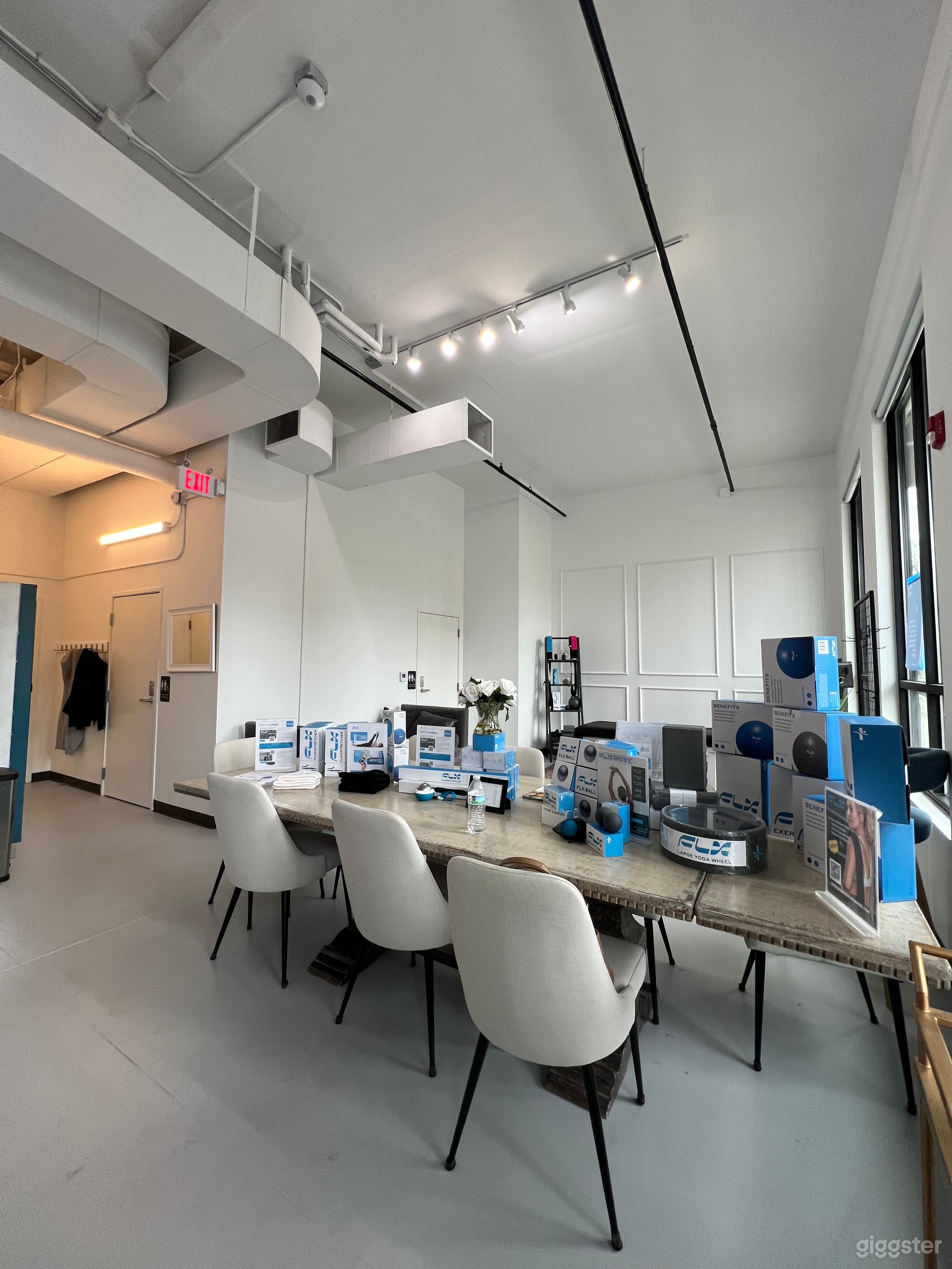 View to the West Wall - table can seat up to 10 with 8 chairs available