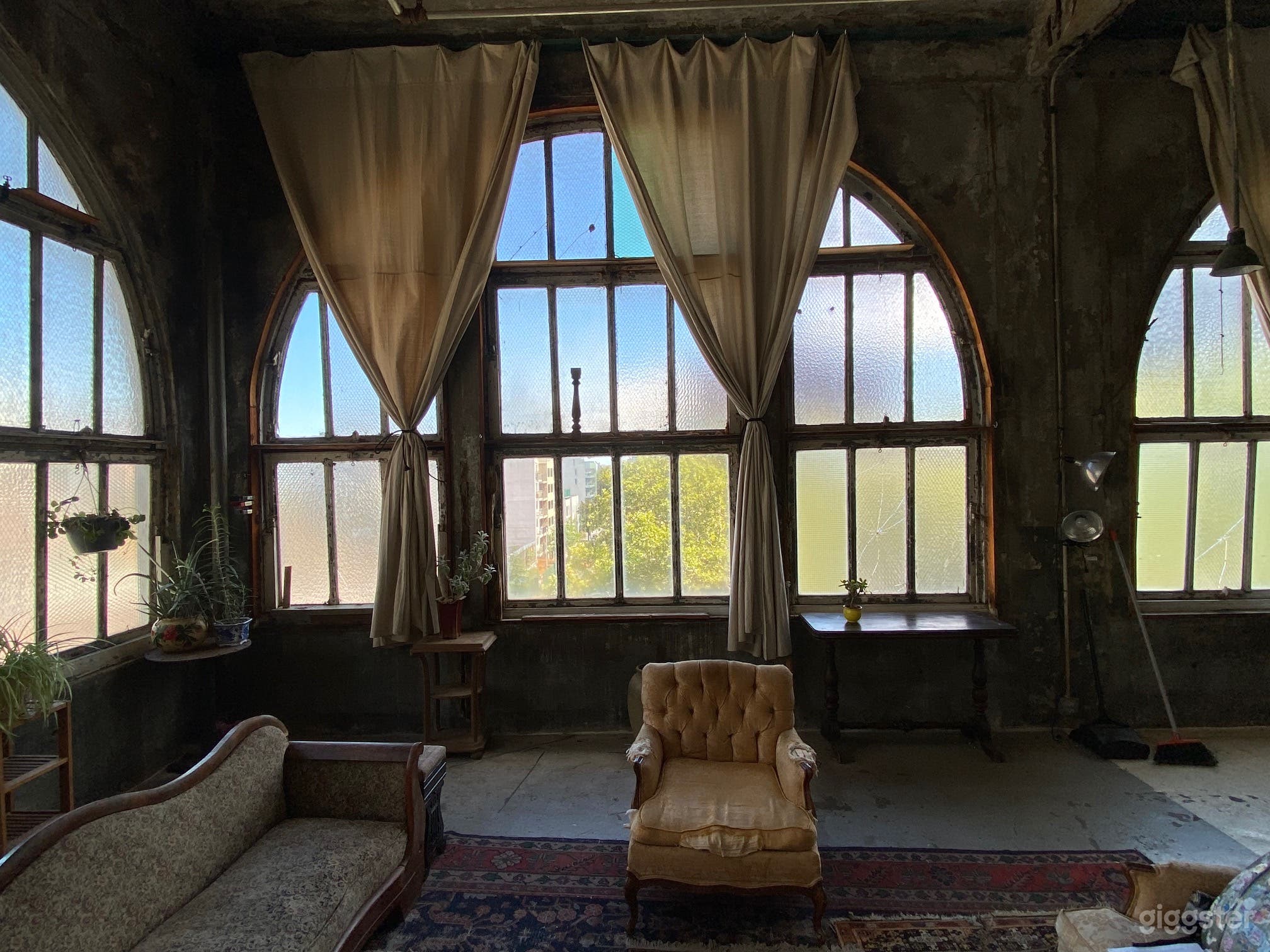 The main room is filled windows.  The distressed walls' patina could never be fully imitated. 