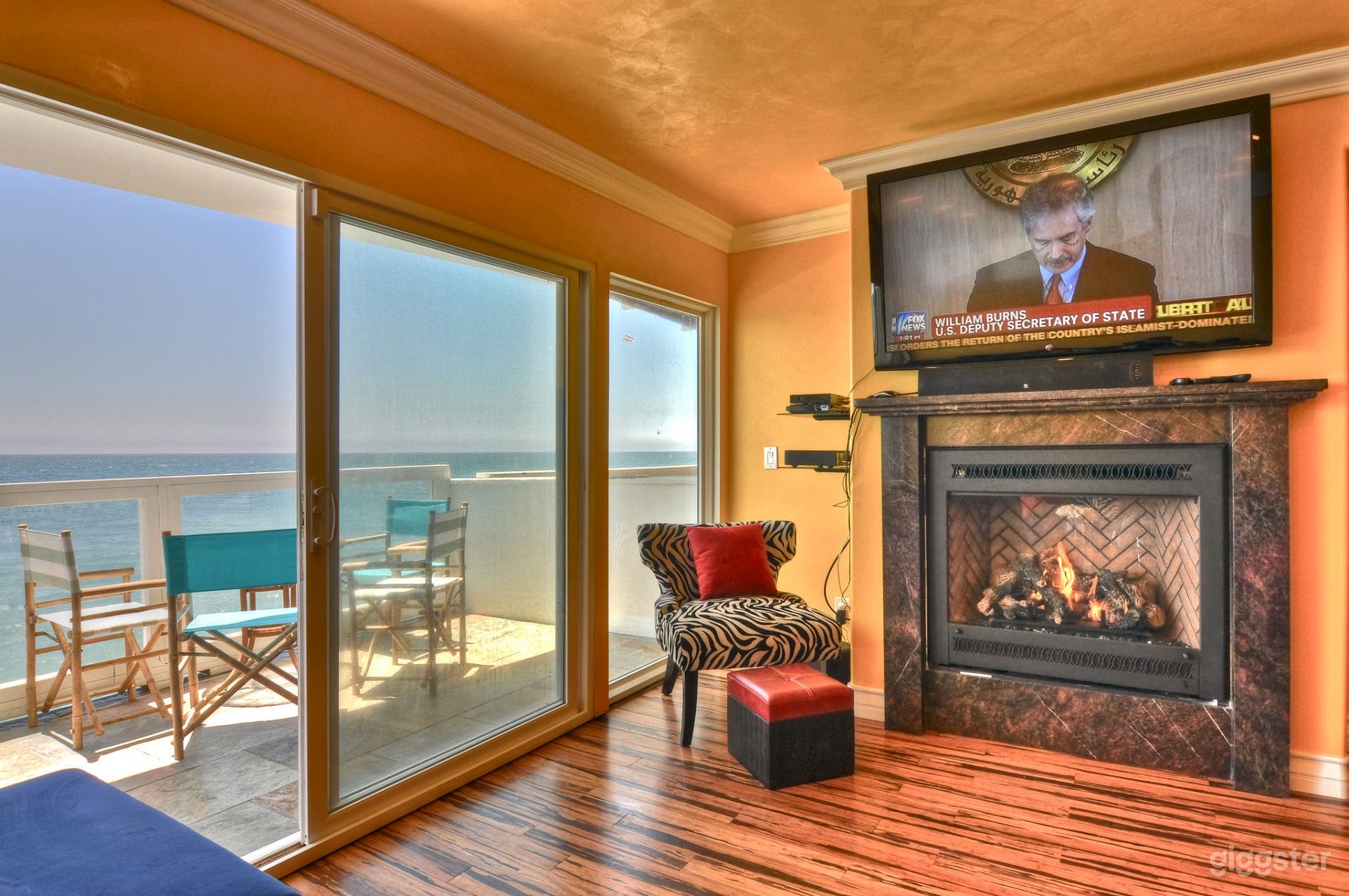 Living Room with Fireplace and its own balcony