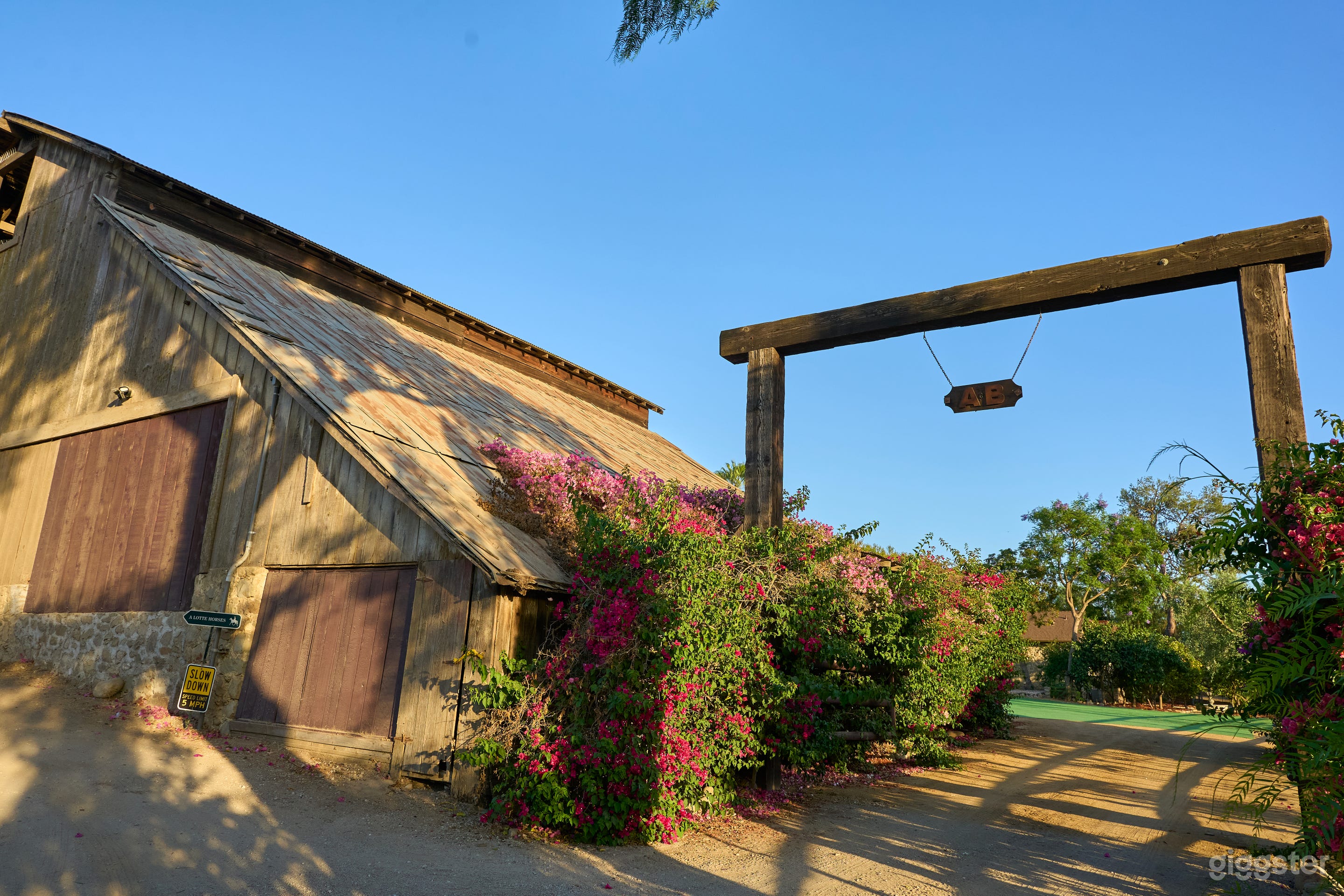 Cinematic Canyon Ranch with Horses, Houses, Barn & Pastures Photo 2