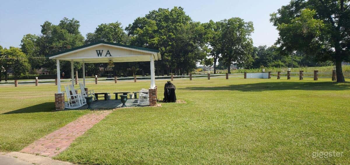 Gazebo for use--Includes rocking chairs and concrete benches as seating