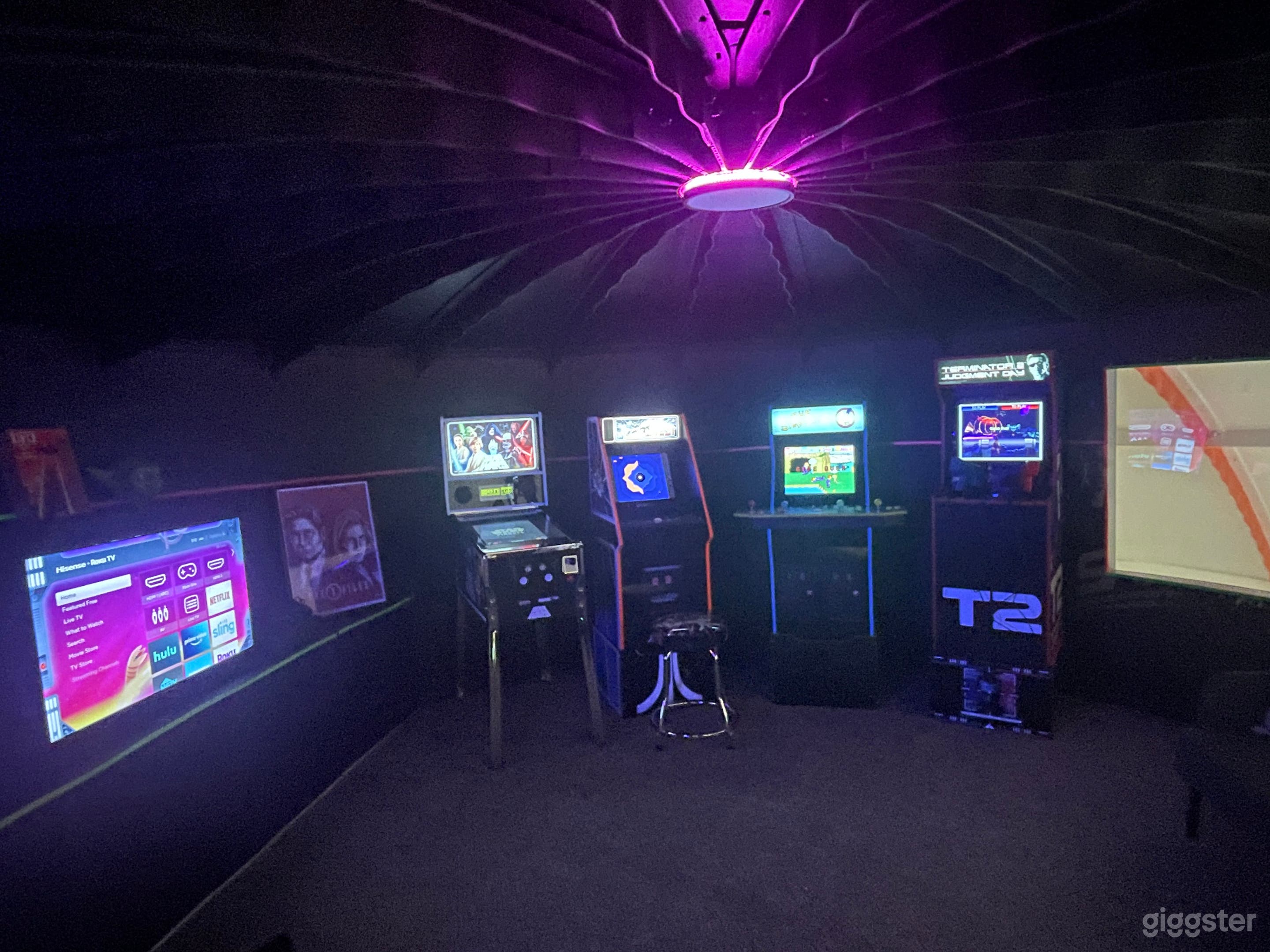 2nd floor loft Galaxy Arcade. Accessed by the spiral staircase. I have multiple arcade games including: Star Wars Pinball, Tempest/Atari 12 in 1, Simpsons, Terminator 2, Outrun (Sit down racing game) and a smaller version of Pac-Man. 