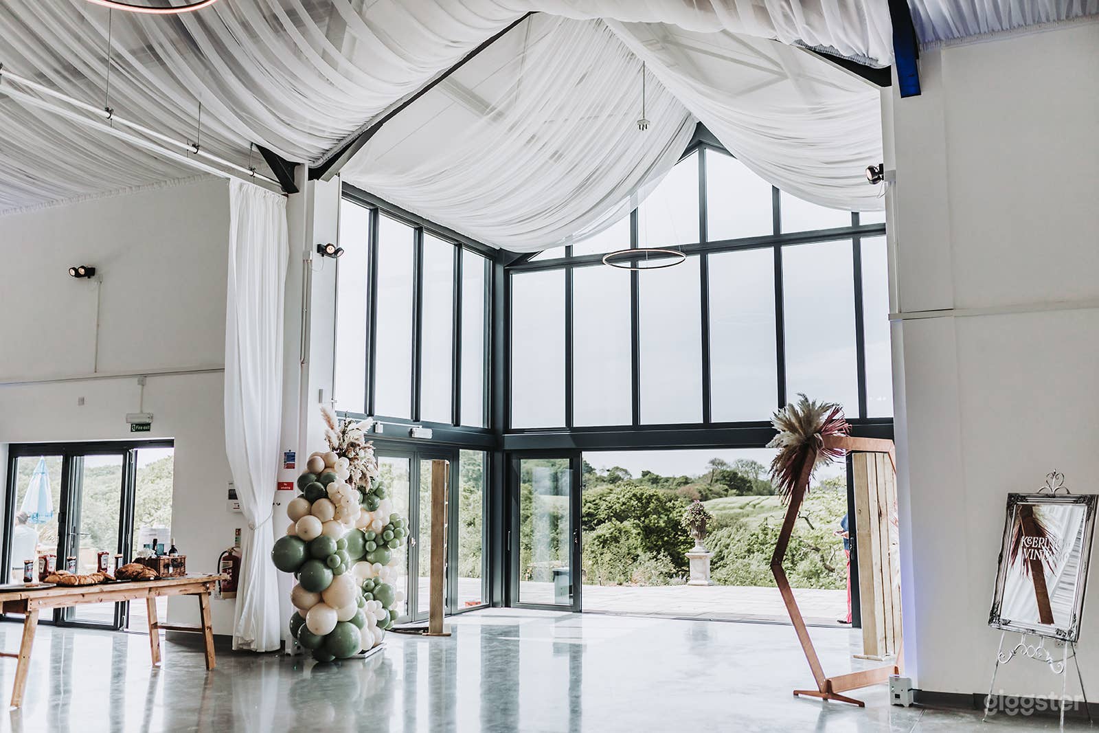 Glass Fronted Venue Overlooking Lakes on a Farm Photo 3