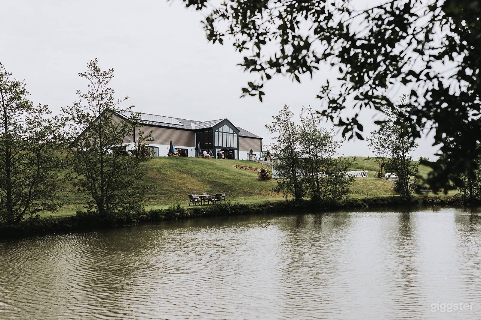 Glass Fronted Venue Overlooking Lakes on a Farm Photo 1