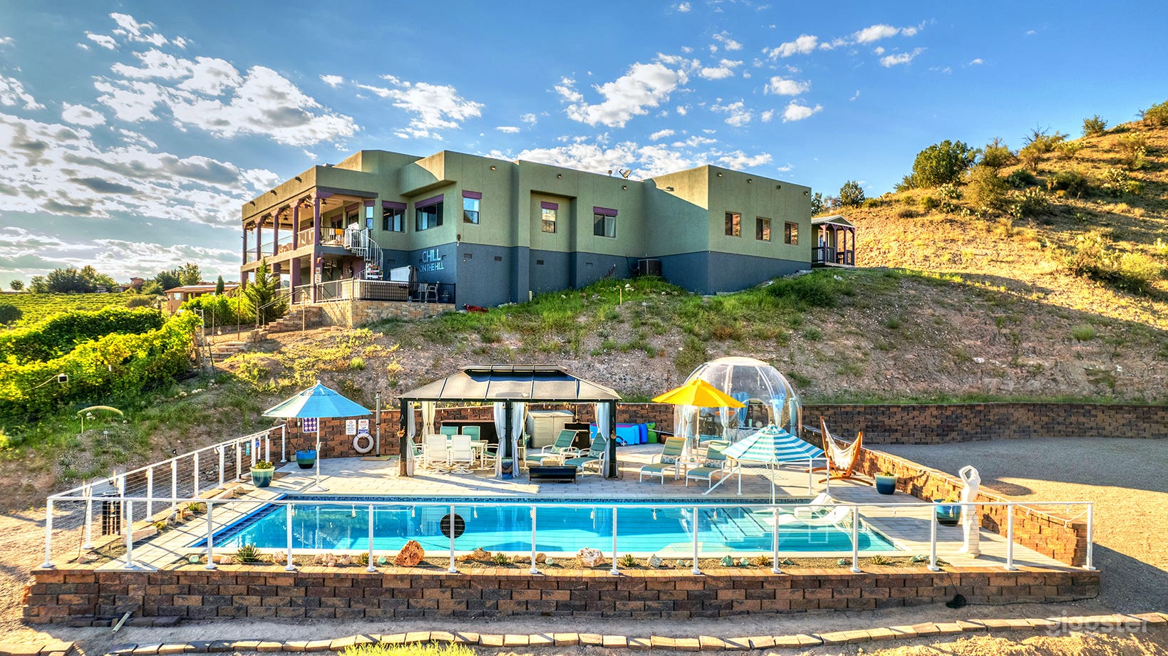 Luxury adobe style Southwest home with over 2,000 sq ft of outdoor living space.