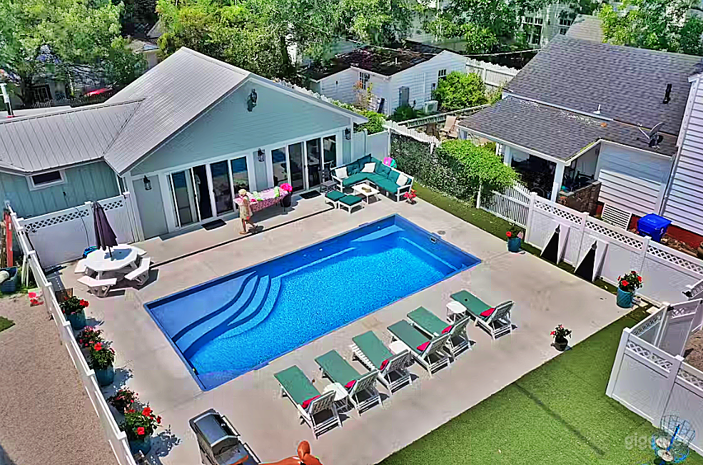 Radiant Rectangle Pool with Lawn Photo 2