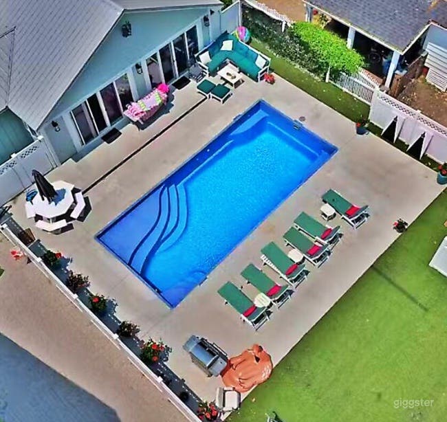 Radiant Rectangle Pool with Lawn Photo 3
