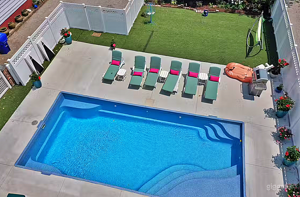 Radiant Rectangle Pool with Lawn Photo 4