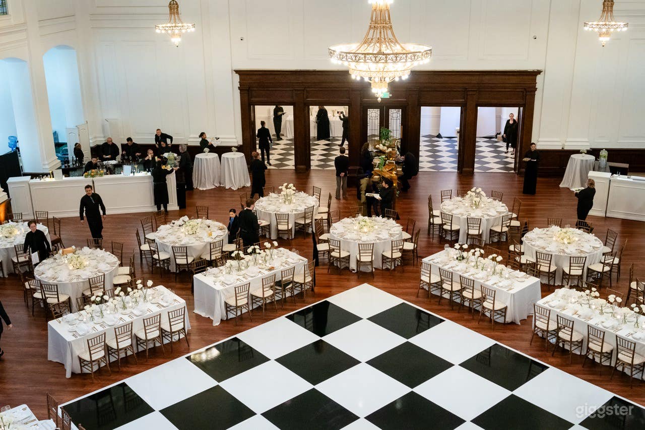 Overhead of black and white dance floor with surrounding reception tables