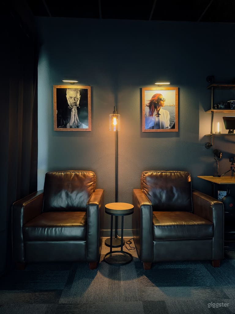  Comfy leather chairs with warm industrial lighting give the office it&#x27;s cozy feel. 