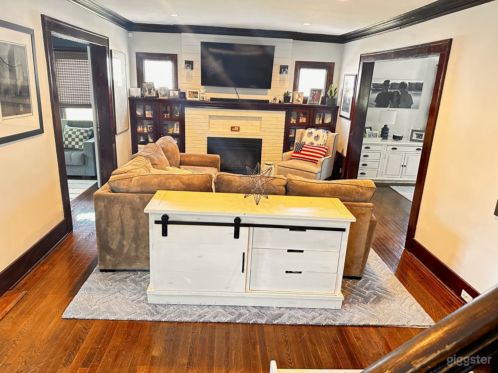 Living Room with gas fireplace.  Receives afternoon sun.