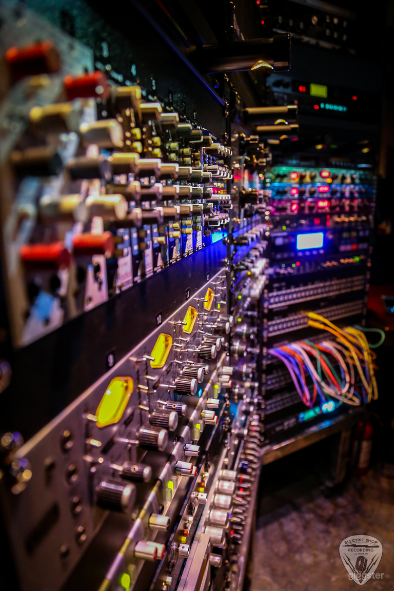  Equipment rack in the control room. We have plenty of hardware, software, drums, basses, guitars, keyboards and percussion. 