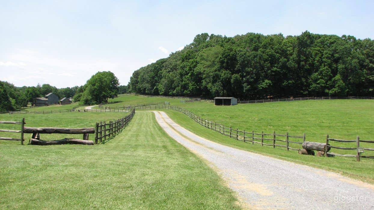 Stunning 30-acre horse farm with antique barn & stables Photo 2