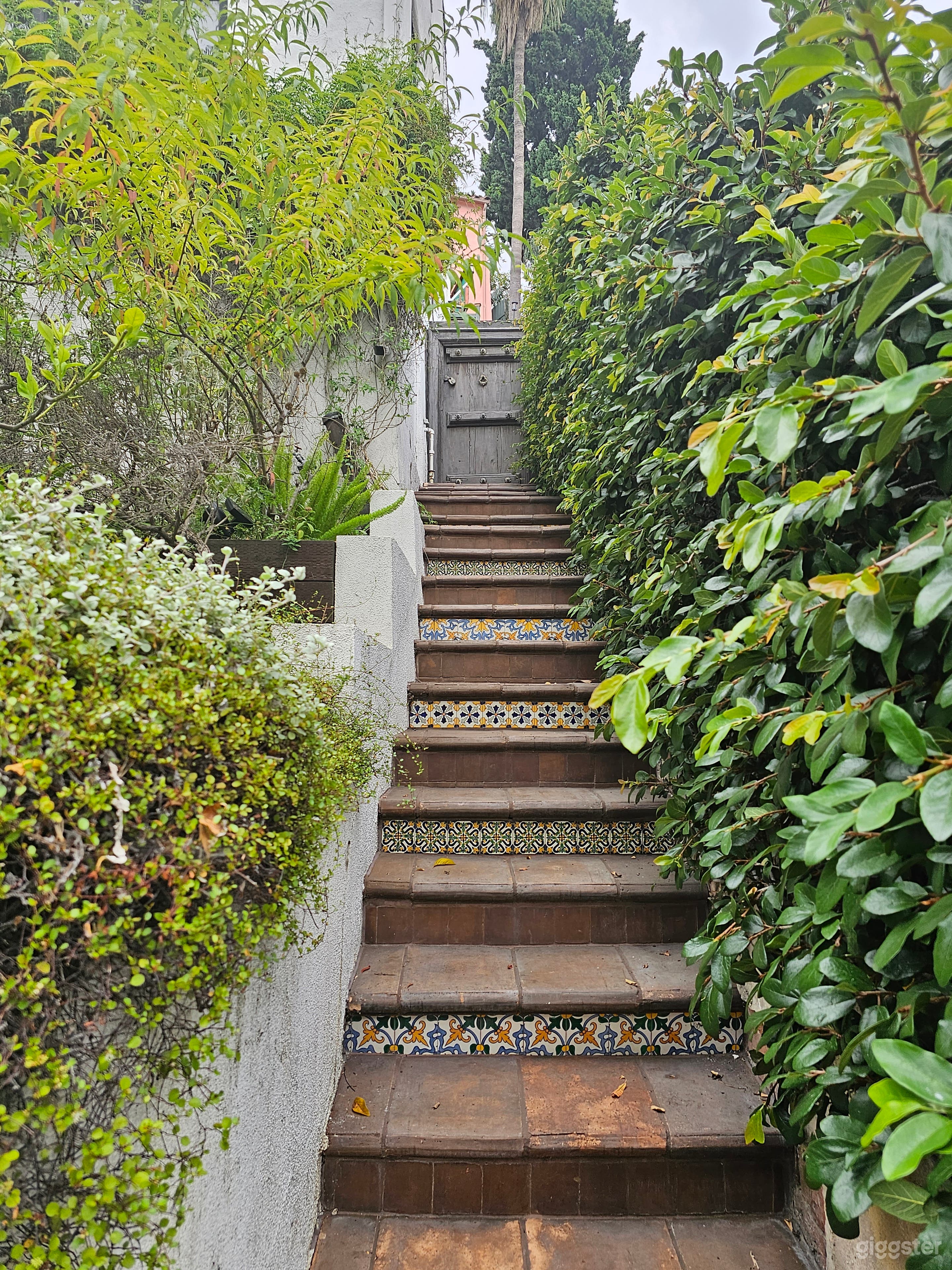 Side entrance on the right of the house