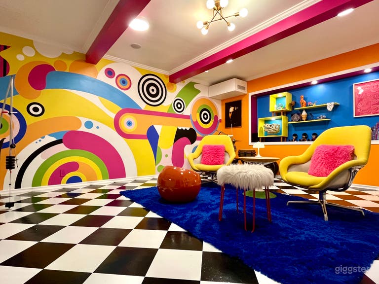  Colorful Family room with fun colorful mural and checkered floor. 