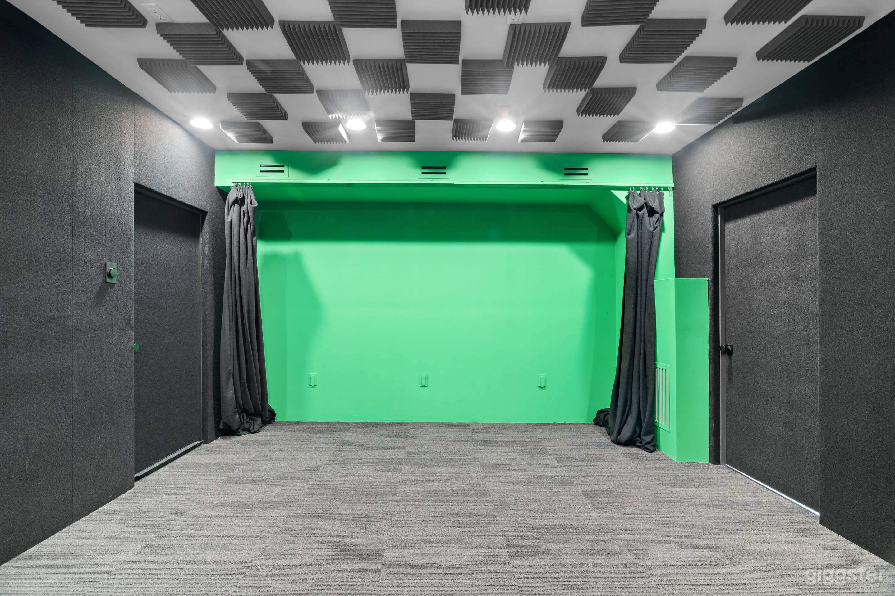 Green screen wall with blackout curtains