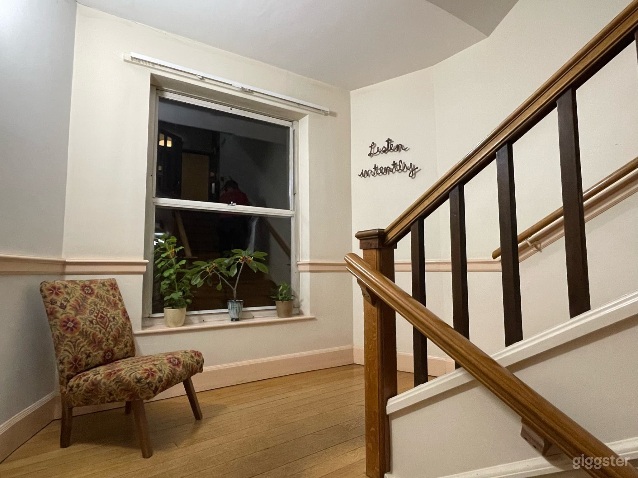 Contemporary artwork on staircase.