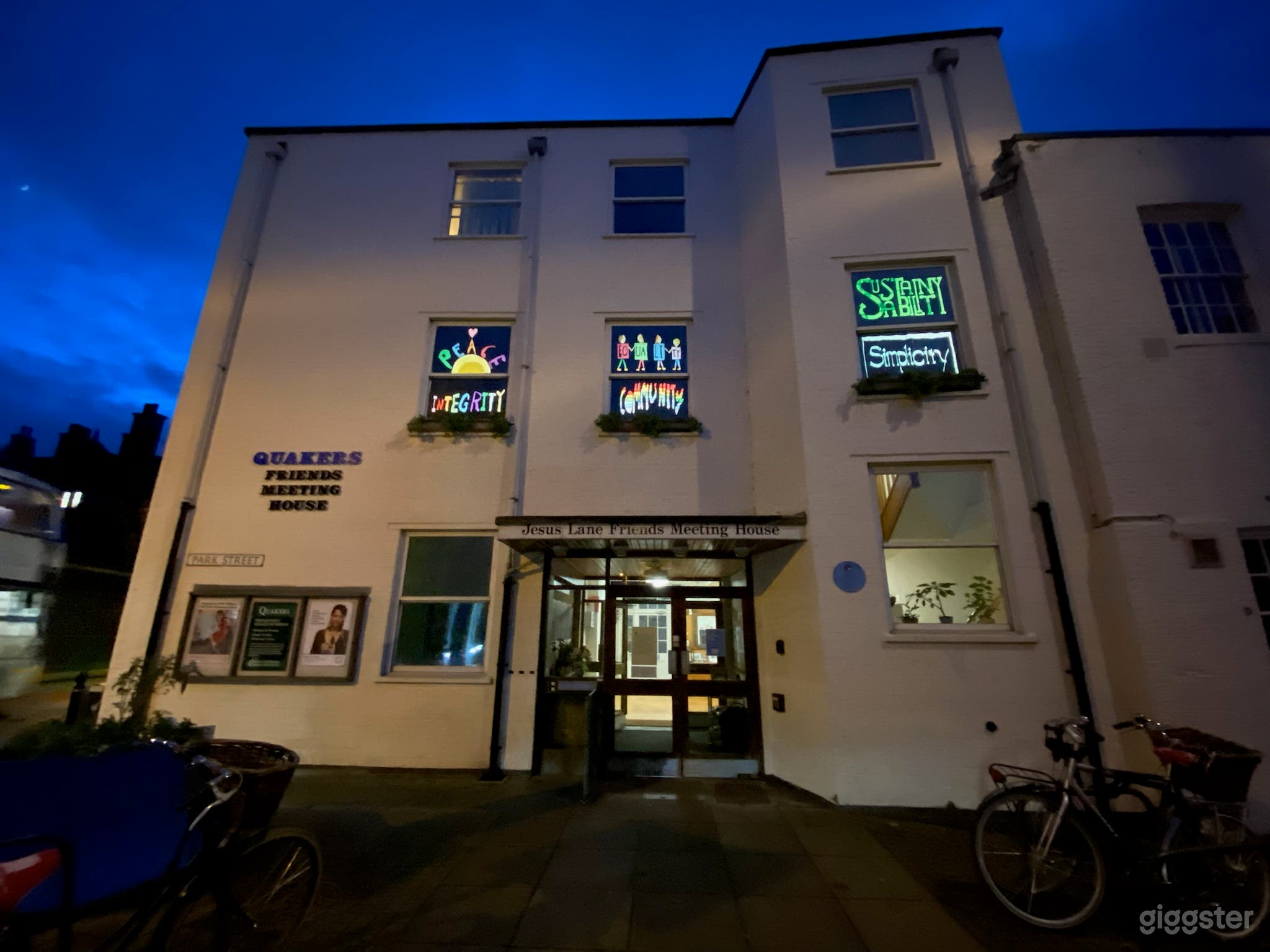 Night view of building  windows shining our testimonies 