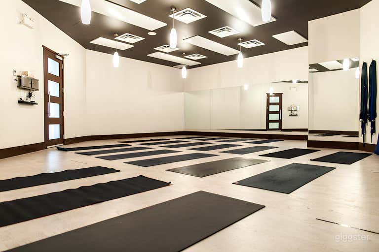  Welcoming and Functional: Equipped with mats and props, this studio provides everything needed for creative or fitness-oriented uses. 