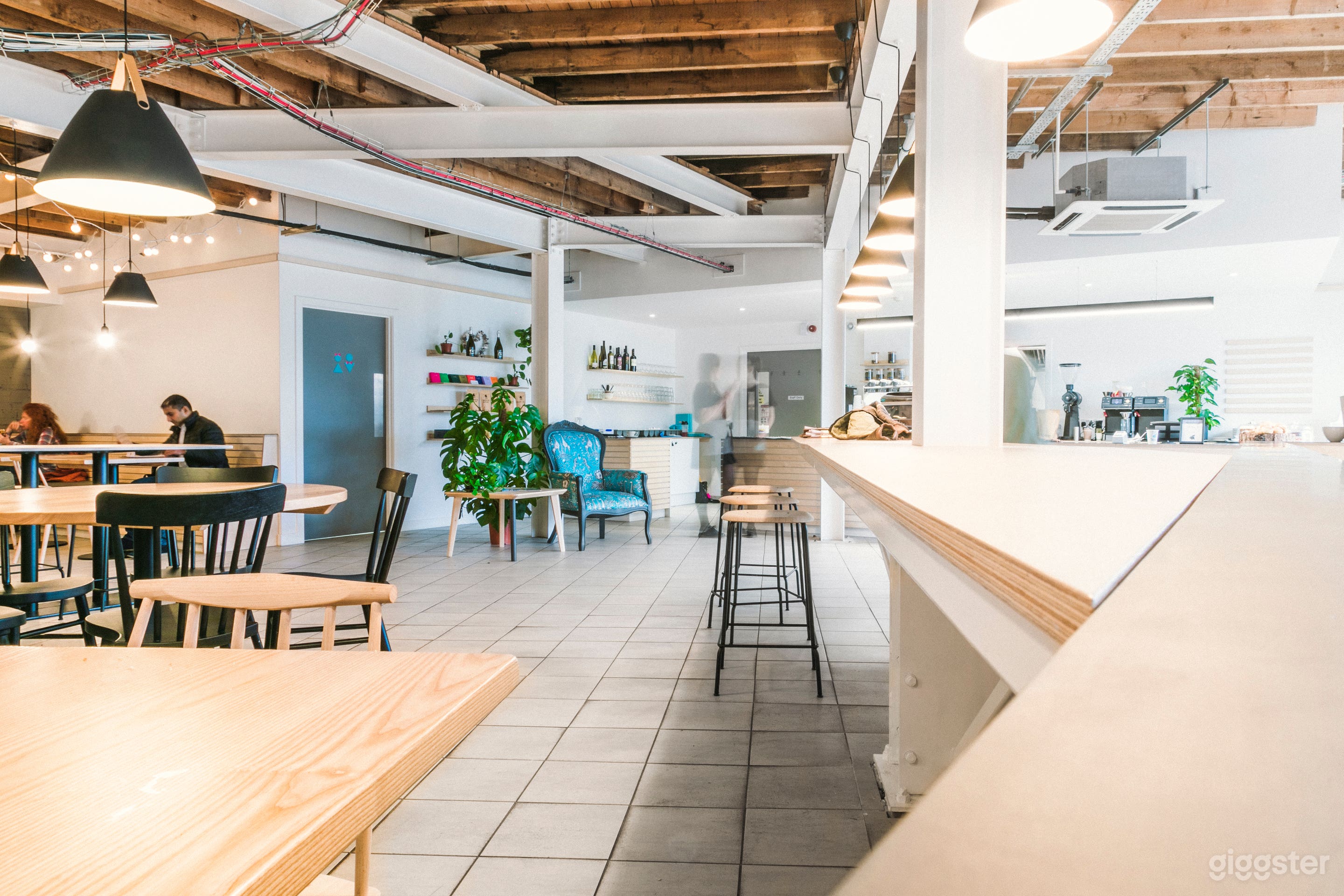 Looking toward the coffee bar and equipment along the high table