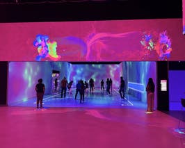  Large, open floorplan with long bar and 5 small game pods. 