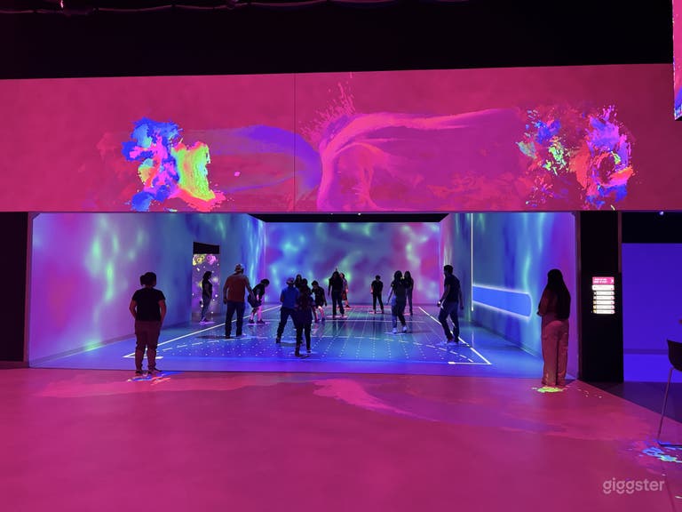  Large, open floorplan with long bar and 5 small game pods. 