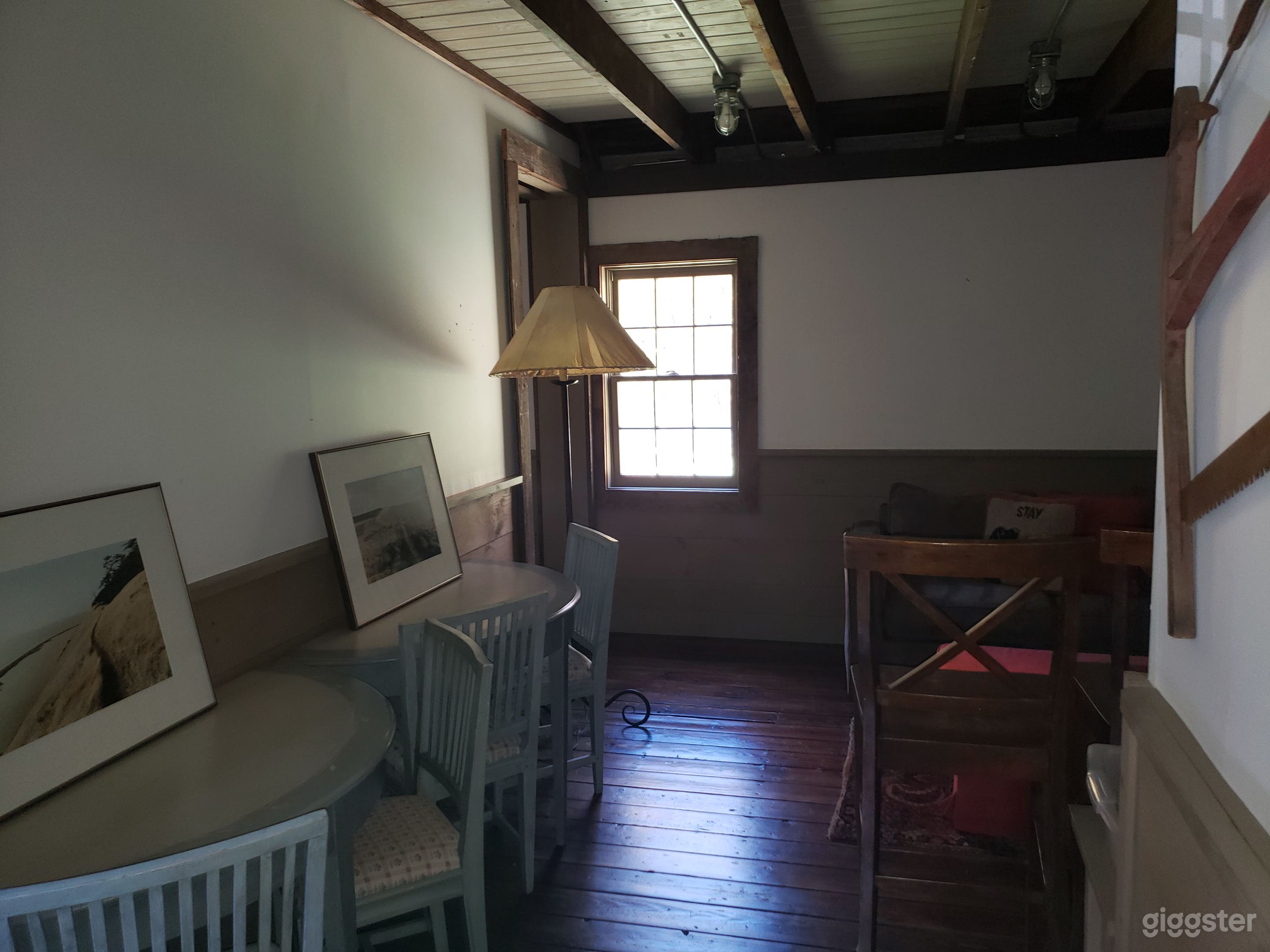 Wall behind TV in the upstairs of barn. Powder room