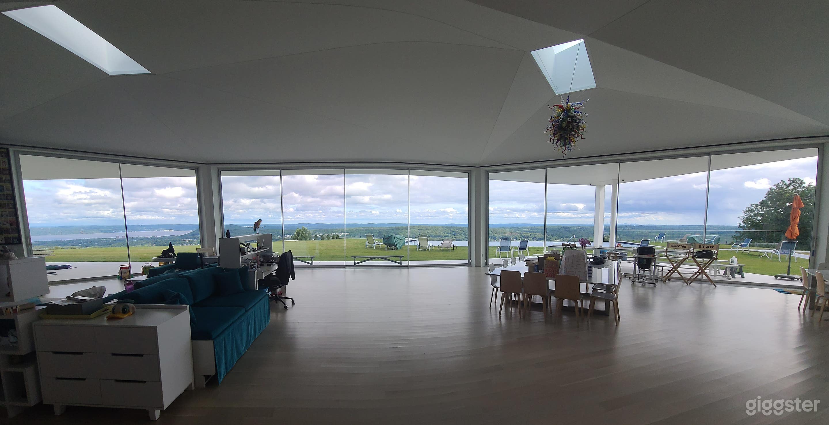 Entering the house View of all the windows in front of New York City and the Hudson and the infinity pool