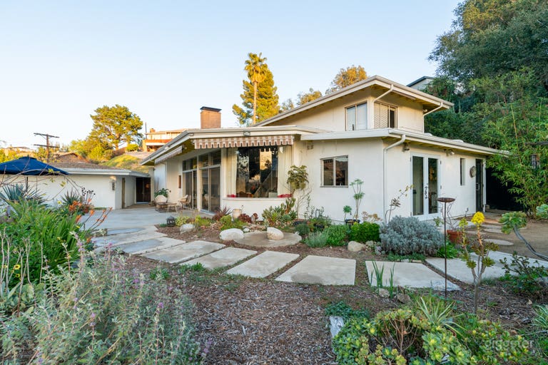  Modernist Home set in a grand hillside garden 