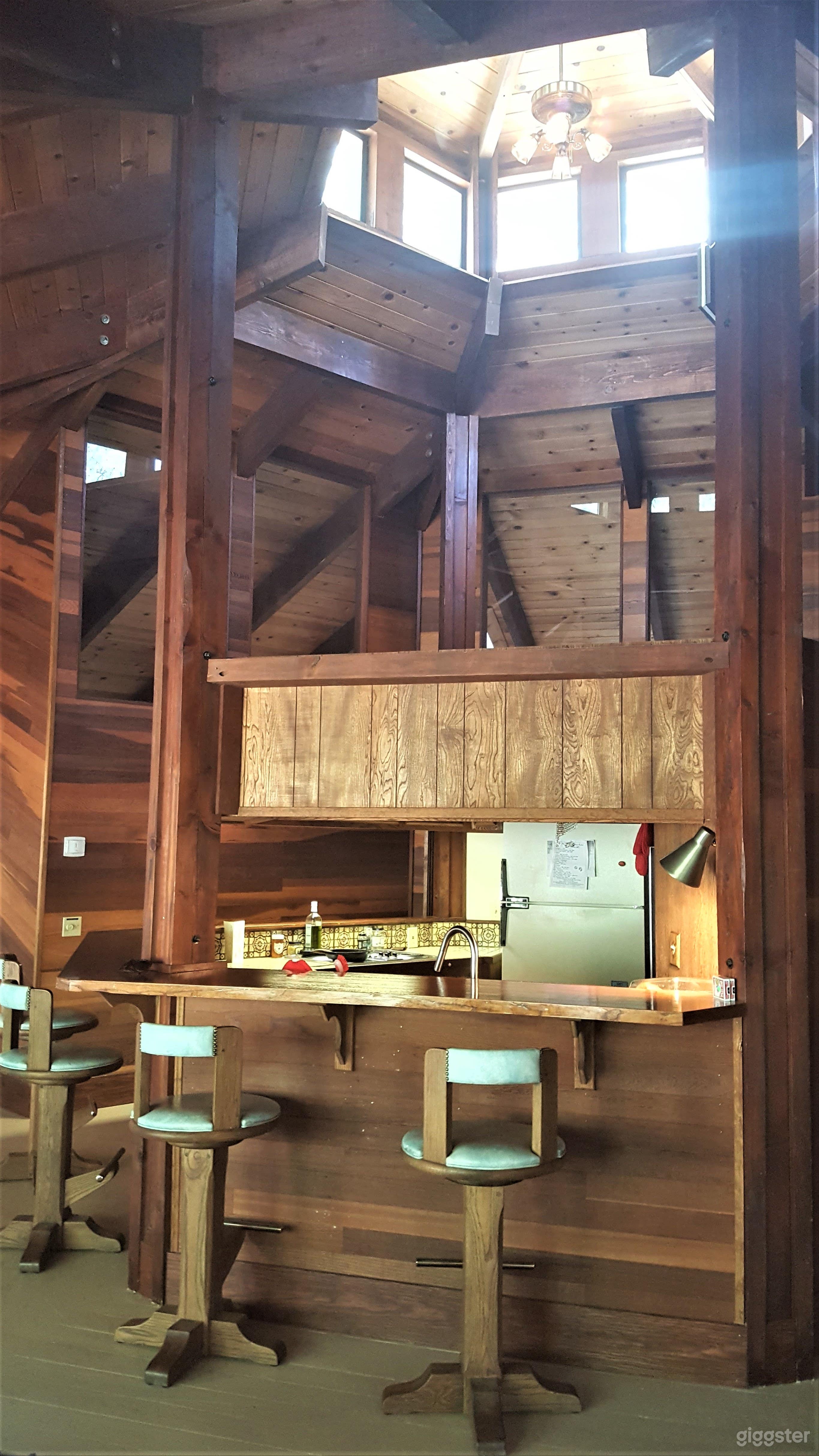 Massive peak above the central vintage kitchen that connects the 8 sides of the octagon home. The home is literally built around the vintage kitchen.