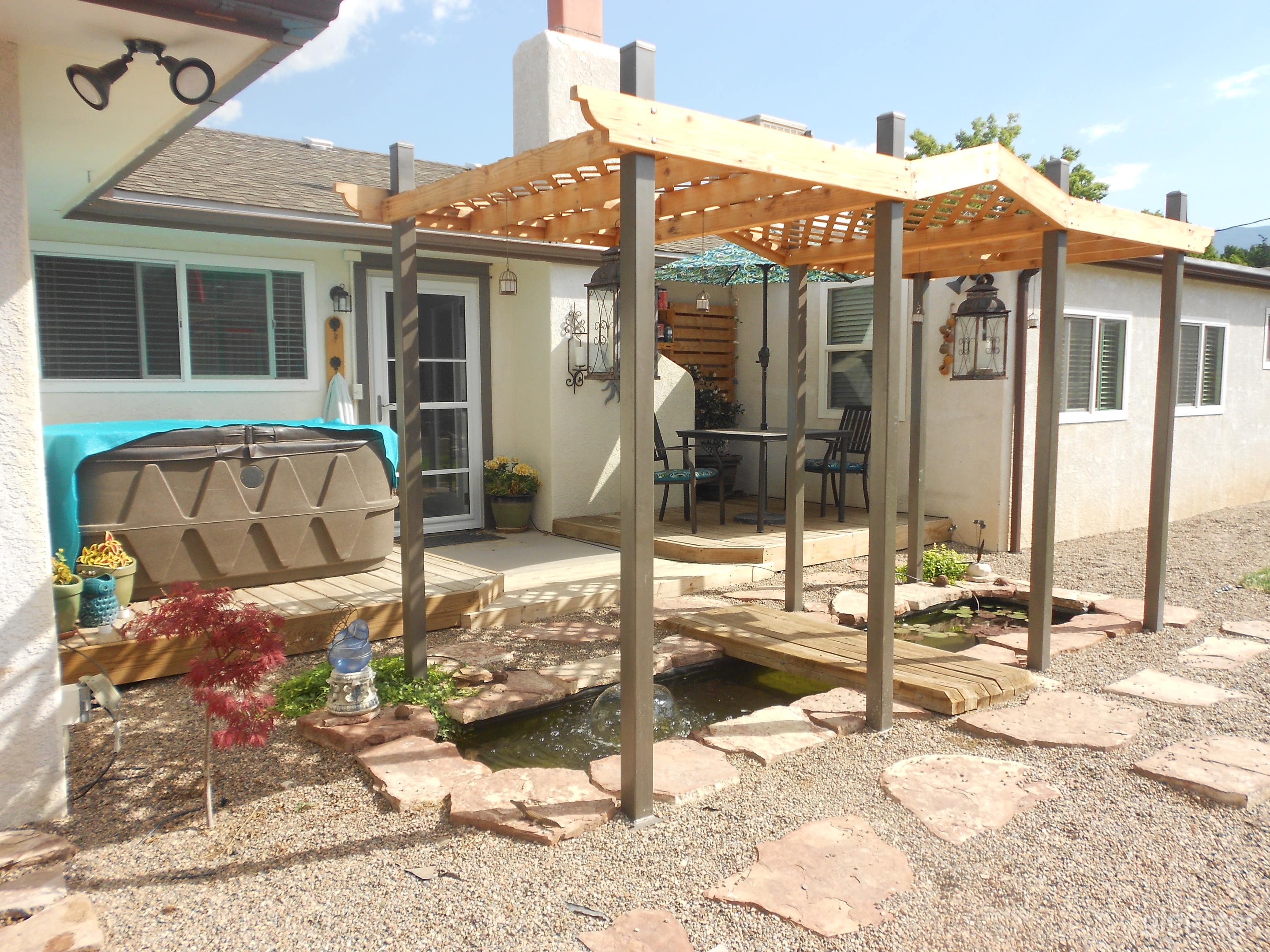Deck with pond off of master bedroom exit.