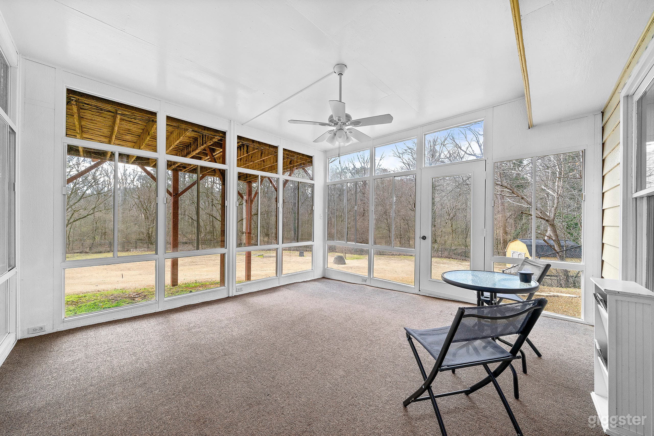 View of the secluded backyard from the sunroom.