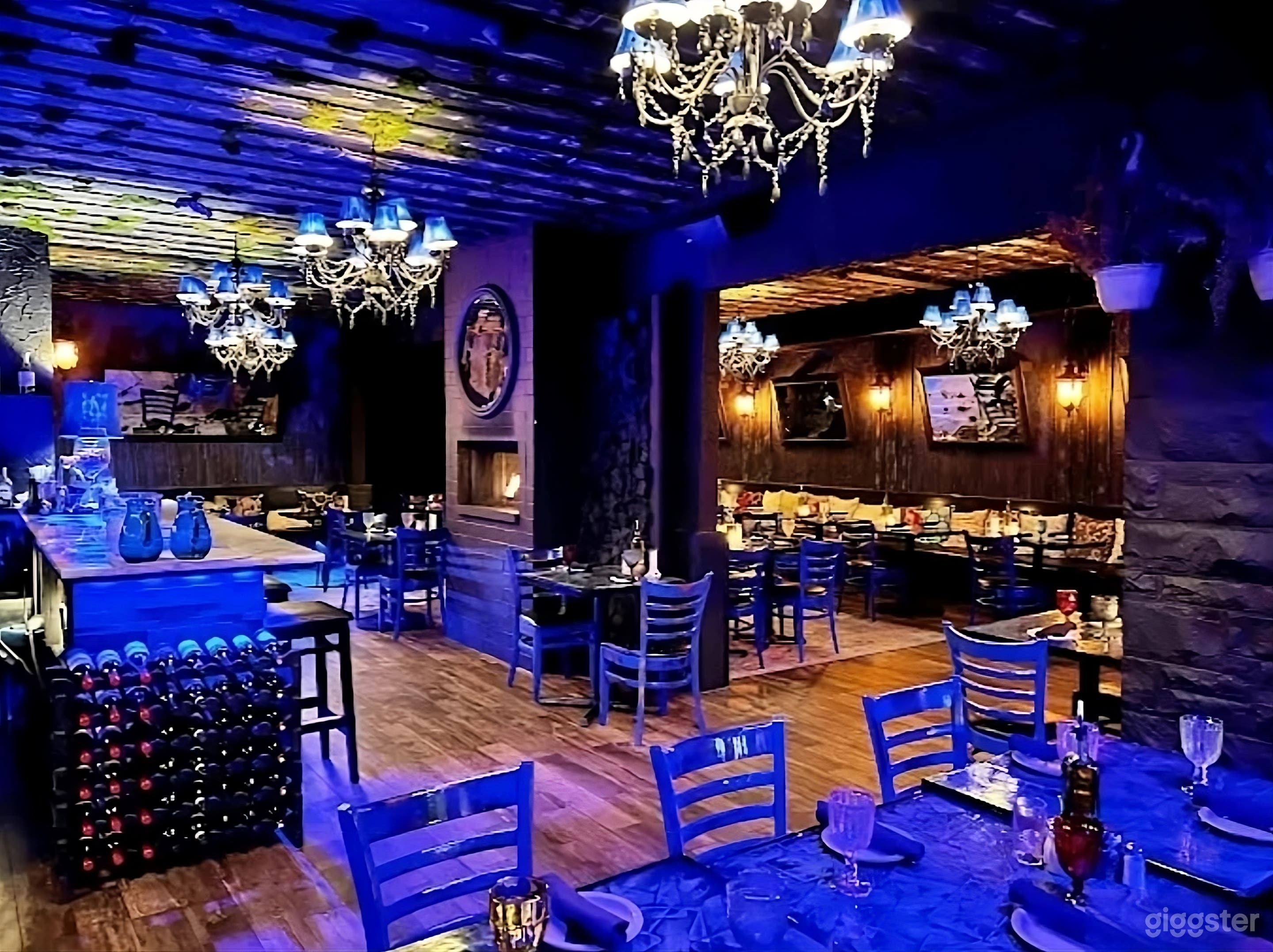 Dark-themed Event Space with Bar Photo 1