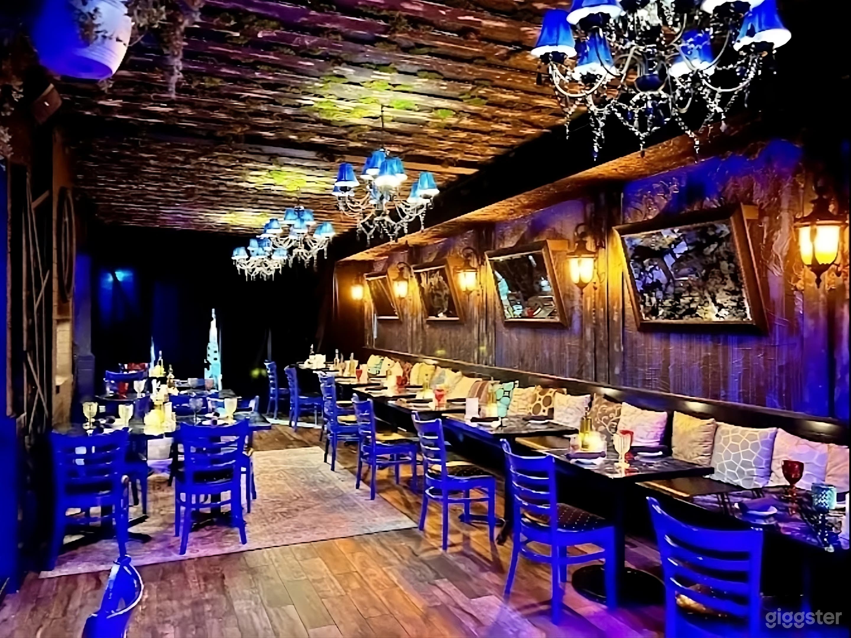 Dark-themed Event Space with Bar Photo 2