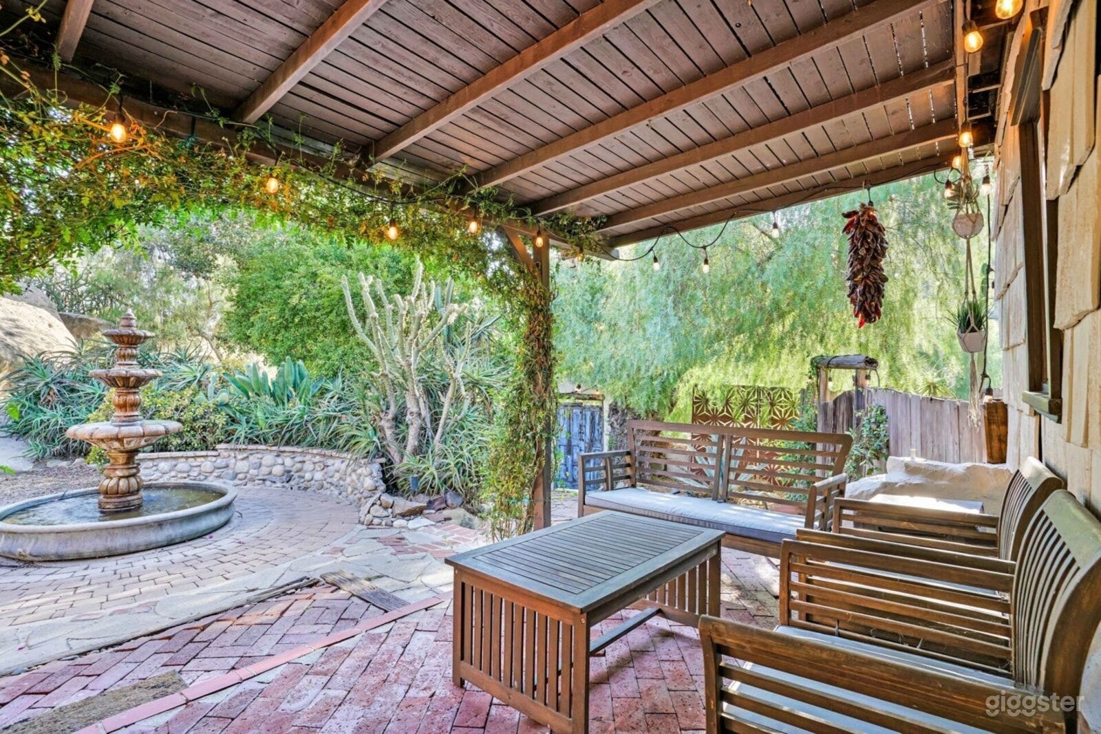 Backyard with Waterfall, Outdoor Tubs &amp; Ancient Boulders Photo 4