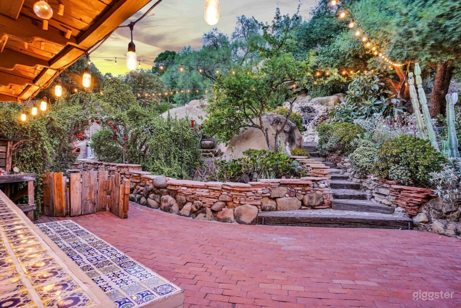 Backyard with Waterfall, Outdoor Tubs &amp; Ancient Boulders Photo 3