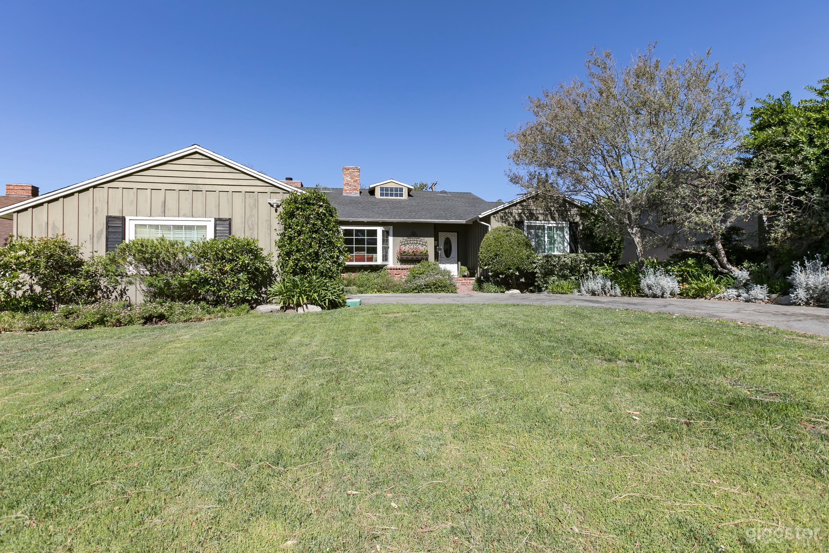 Newly Painted, Official Size Pickleball Court with Lights in Backyard with Gazebo, BBQ, Water Fountain, Grass and Landscaping