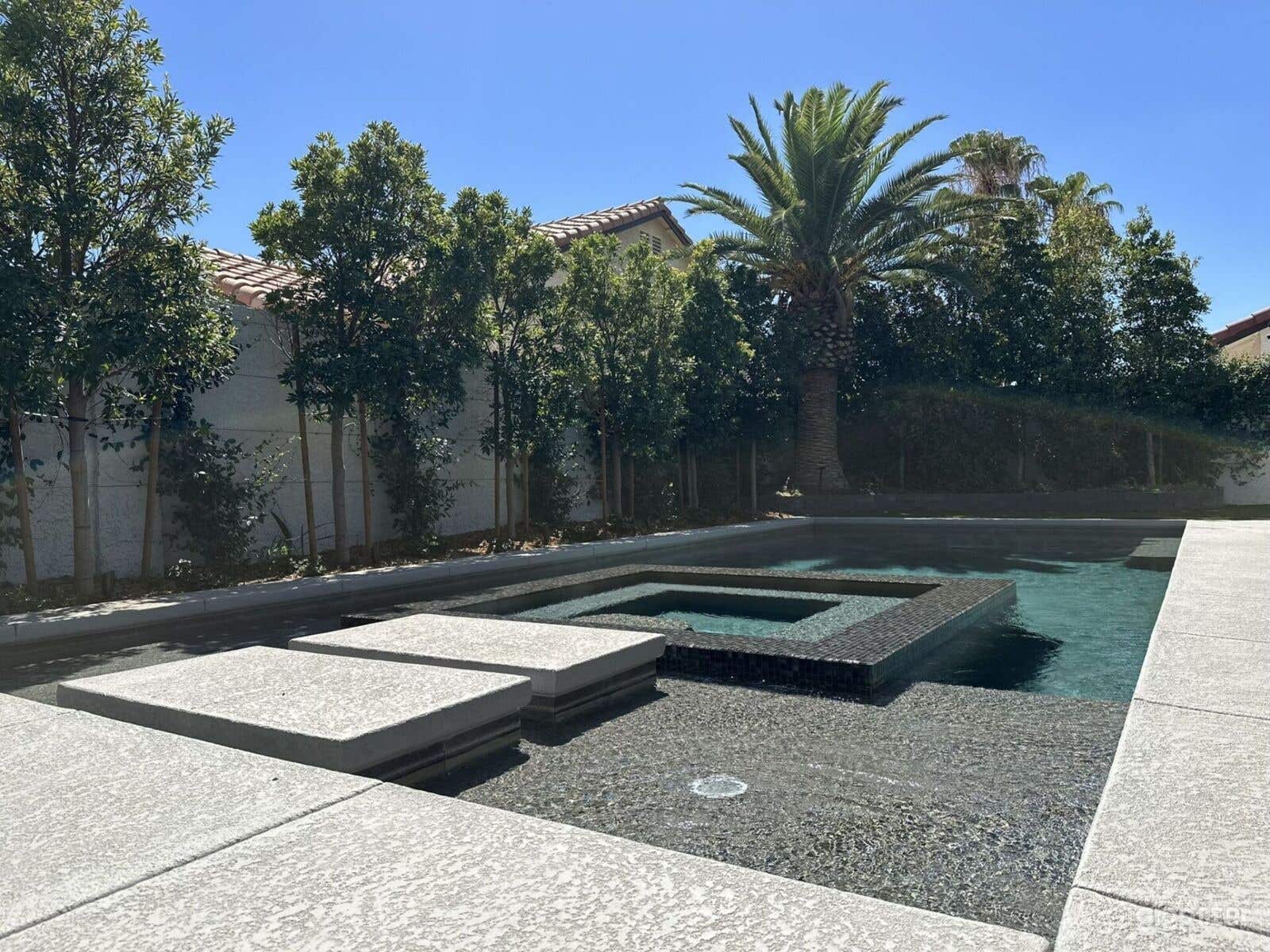 Stunning Pool in a Designer Oasis Home Photo 3